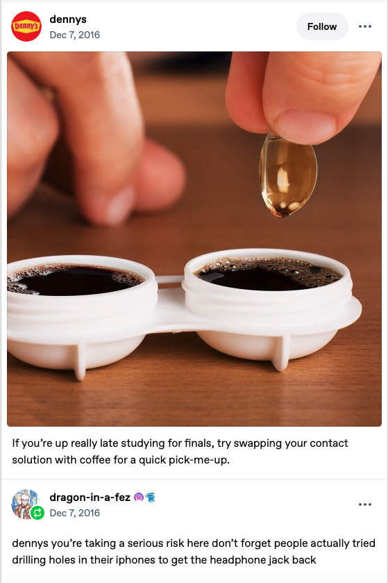 An image of a hand dipping contact lenses into a solution of black coffee